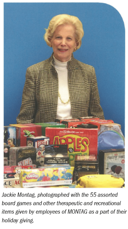 Photo of Jackie Montag with donations