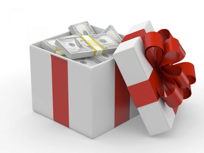 Image of cash in a gift box