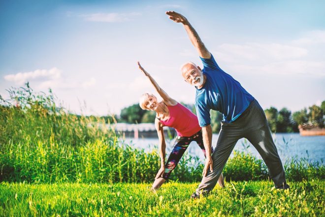 Retirees doing yoga photo